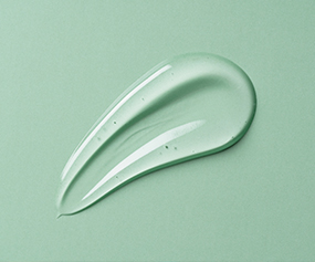 Clear beauty peptide serum on green background for skin elasticity and collagen boosts